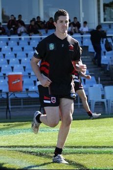 Patrick Hasson runs onto Shark Park for the gio schoolboy cup (Photo : OurFootyMedia)