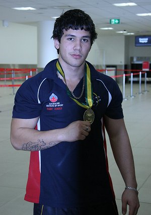 Dylan CARTWRIGHT proudly shows his 2011 Col Matthews Medal (Photo : OurFootyMedia) 