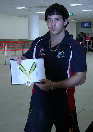 Dylan CARTWRIGHT proudly shows his 2011 Col Matthews Medal (Photo : OurFootyMedia) 