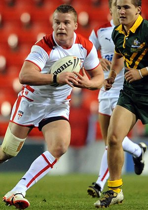 Adam Milner runinng against the Australian Schoolboys last year 