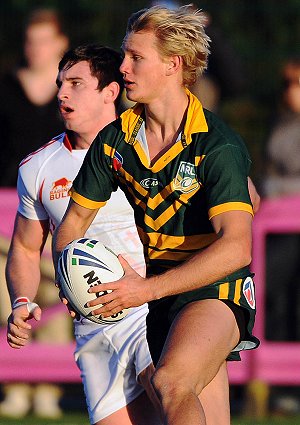 AIS winger Luke Conaghty runs around the England line (Photo's : dave williams RLphotos.com)