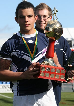 Adam Milgate proudly holds the famous Sam Davey Plate Trophy (Photo : ourfootymedia)
