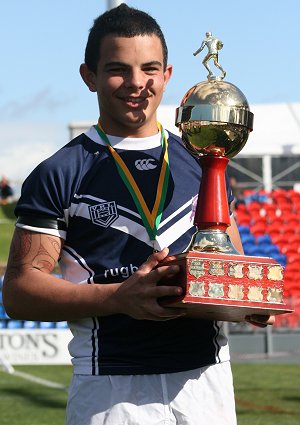 Adam Milgate proudly holds the famous Sam Davey Plate Trophy (Photo : ourfootymedia)