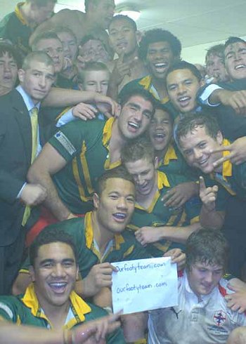 Aussies celebrate in the LOckerRoom with their Thenks ourfootyteam.com sihn, well it's an honour fella's. -  's' (Photo Ste Jones UK)