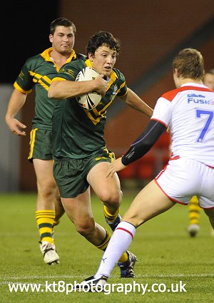 Iain Riccardi about to roll over Sam Powell 