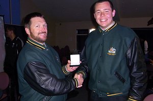 ASSRL Coach Peter Denman presents Man of the Match Medal to Dave KLEMMER