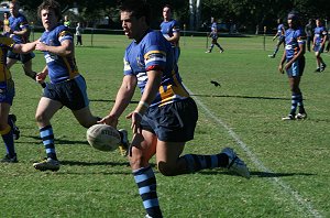 Chris Binge kick the footy ahead to his zippy wingers - Parramatta Eels SG Ball Vs NSW CCC U 18's (Photo : ourfooty media)