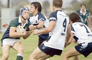 Mater Dei player runs at the Kooringal defence