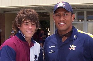 Patrick O'Hanlon with David Faiumu of the Nth QLD Cowboys